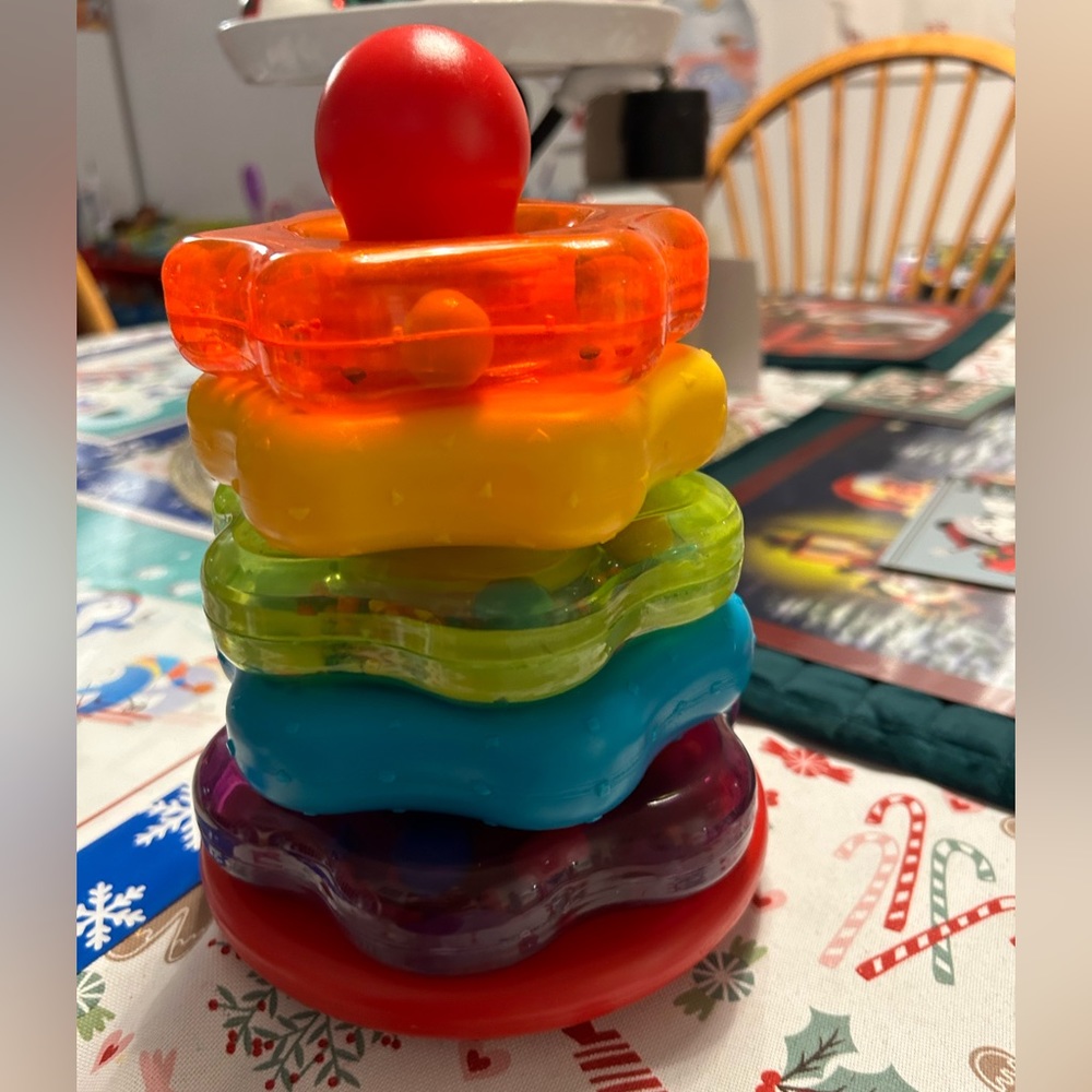 Battat baby stacking rings with rattles. EUC